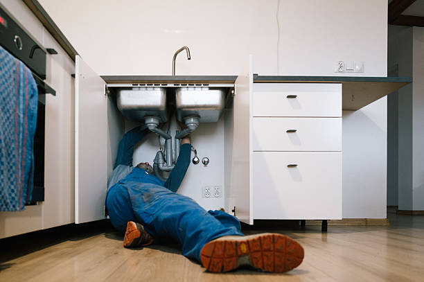Professional Emergency Plumber technician working in Danville, IA